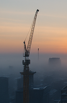 Construction site with crane and building